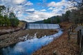 Douthat Lake Upper Dam and Spillway Royalty Free Stock Photo